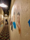 Faces of famous actors and actresses are painted along the hallways of the building.